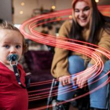 Image of child and women in wheelchair who are eligible to be Prioirity Services Members