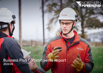 Front cover of Business Plan Commitments Report 2023-24 with image of two Norhern Powergriengineers talking